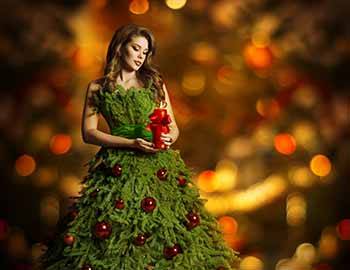 Woman dressed up as a Christmas tree